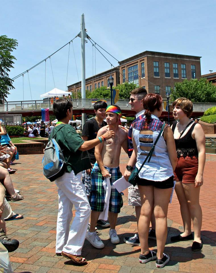 group of people having conversation at Frederick Pride