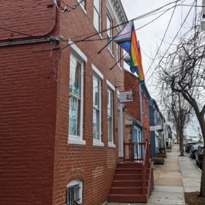 pride flags hanging outside the frederick center