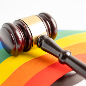 gavel resting on rainbow flag